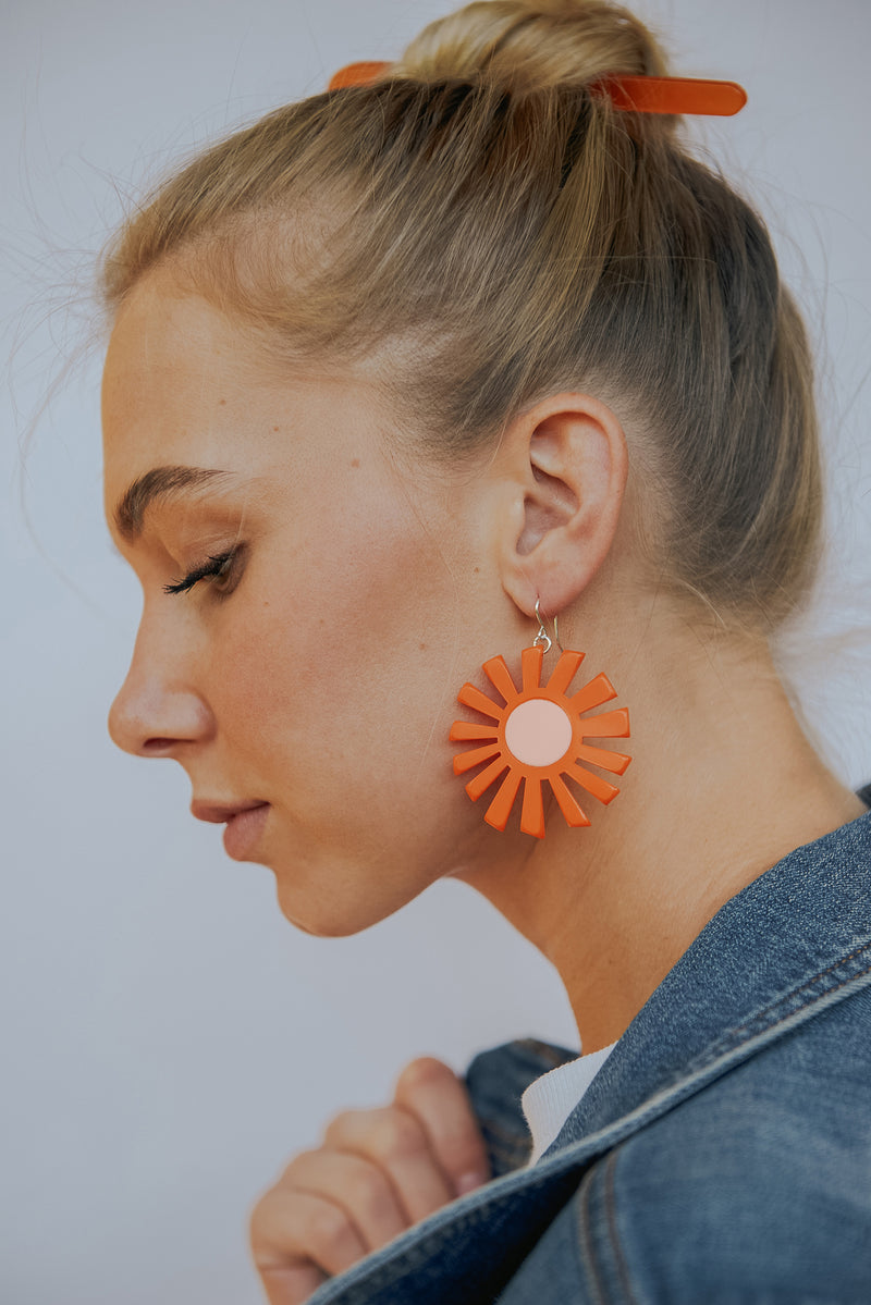 big sun earrings in orange by woll jewelry