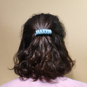 medium length wavy hair style coil barrette