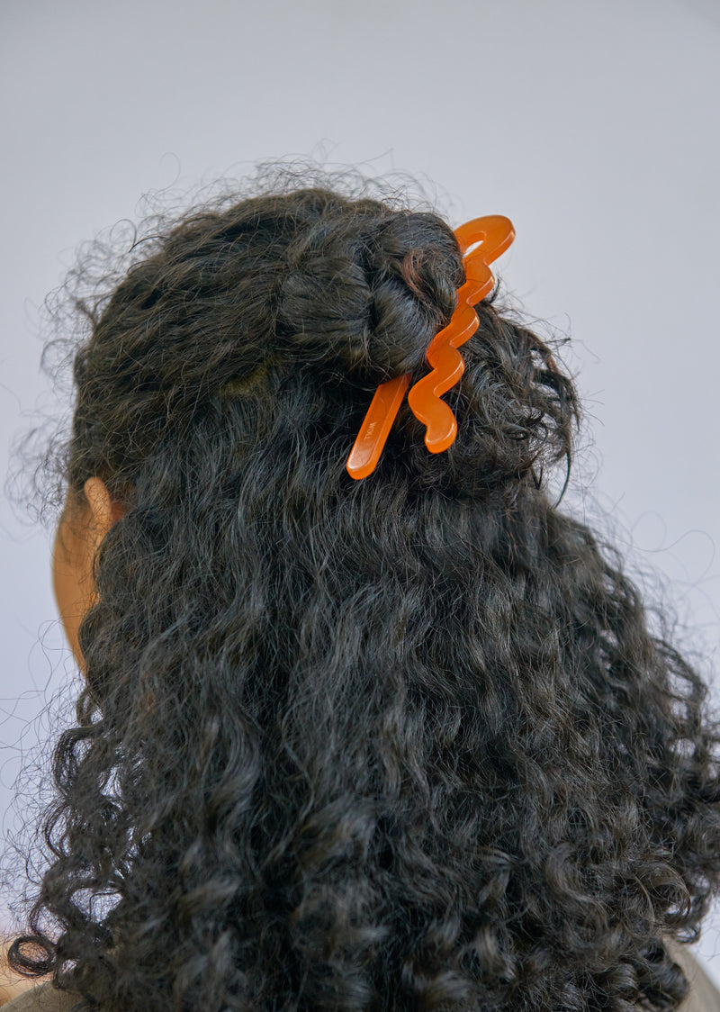 orange giant bobby pin hair stick bun
