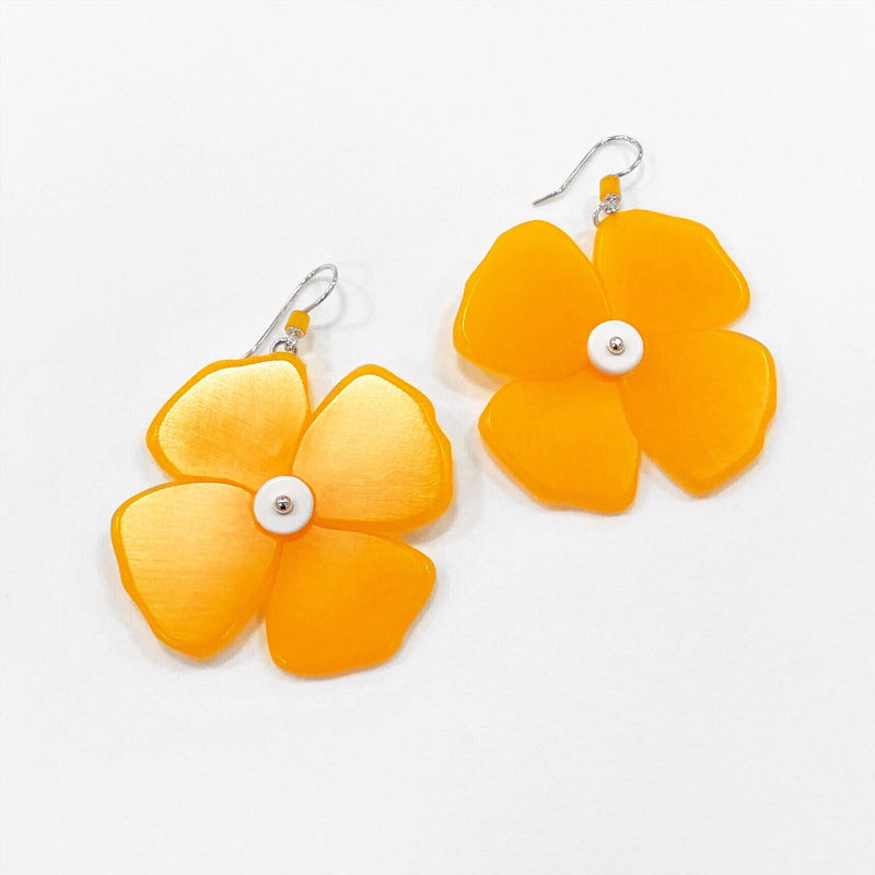 big orange flower earrings by woll